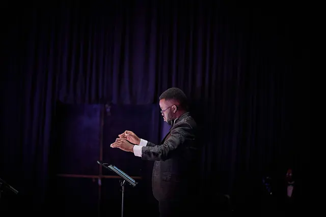 Tinashe Jera conducting the choir
